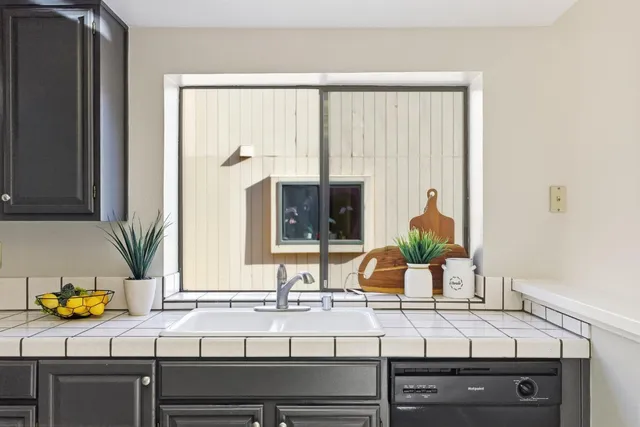 a view of living room with furniture and window