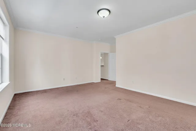 an empty room with a natural light