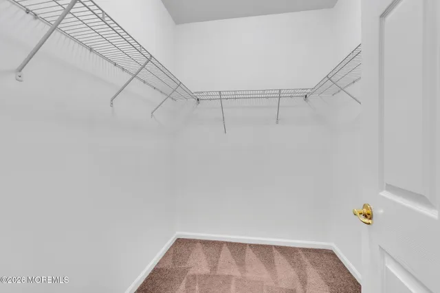 a view of small space with racks on the wall