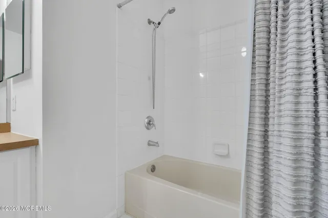 a bathroom with a bathtub