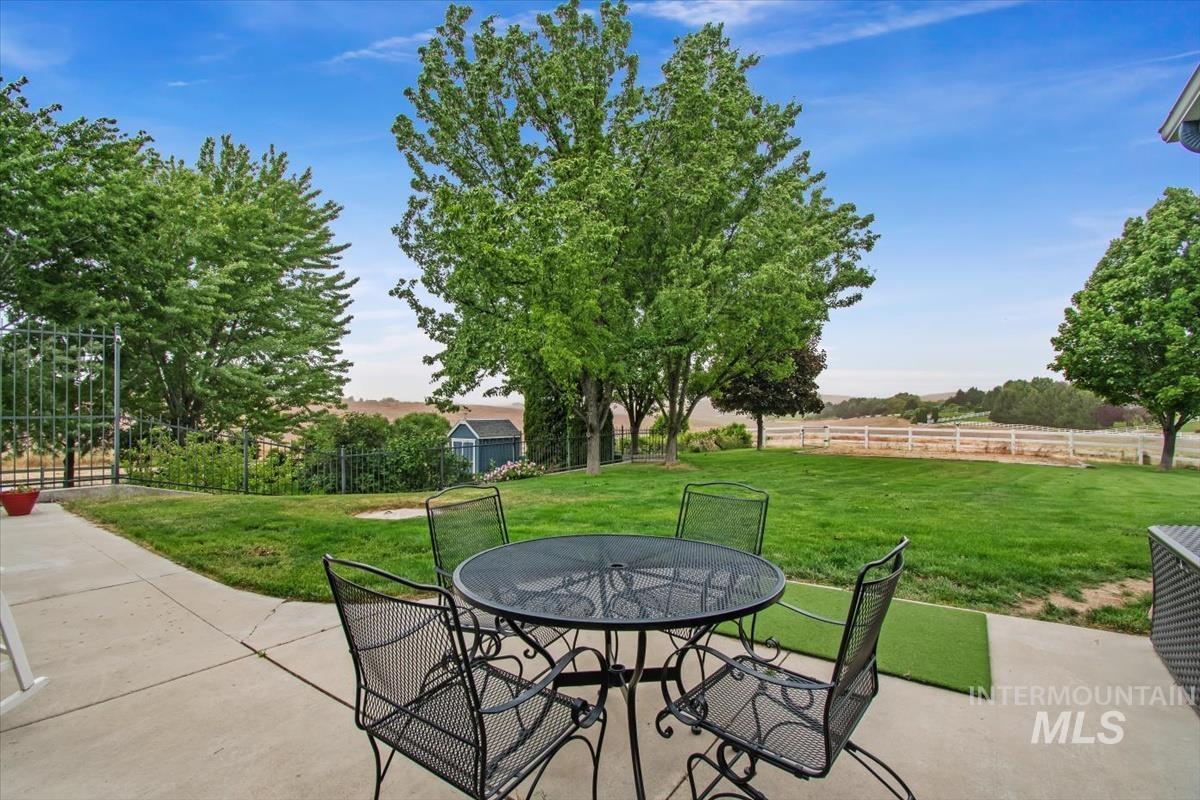 10462 West Lanktree Gulch Road Star, ID 83669 - Photo 38 of 48 Spacious concrete patio with expansive green lawn and mature trees