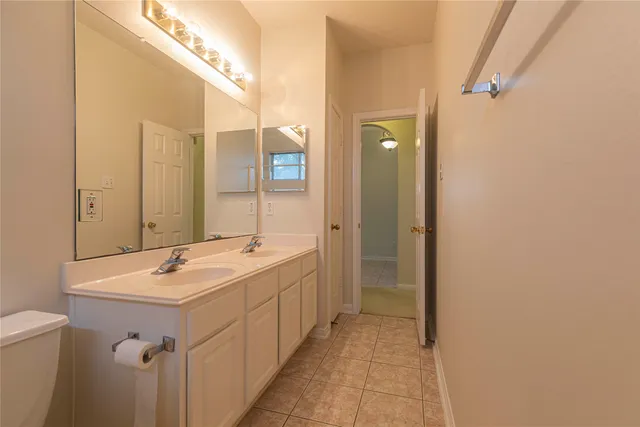 an empty room with a bathroom