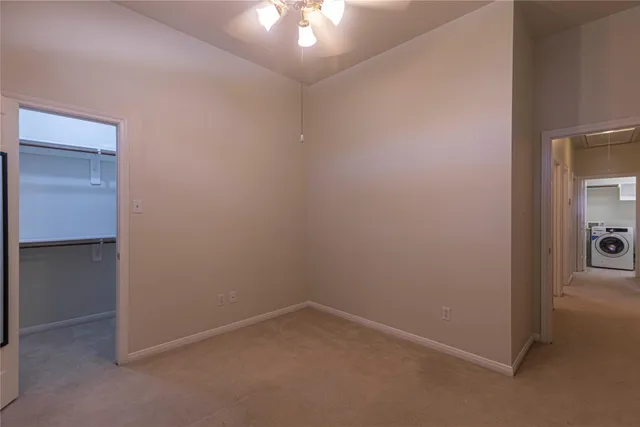 an empty room with a bathroom