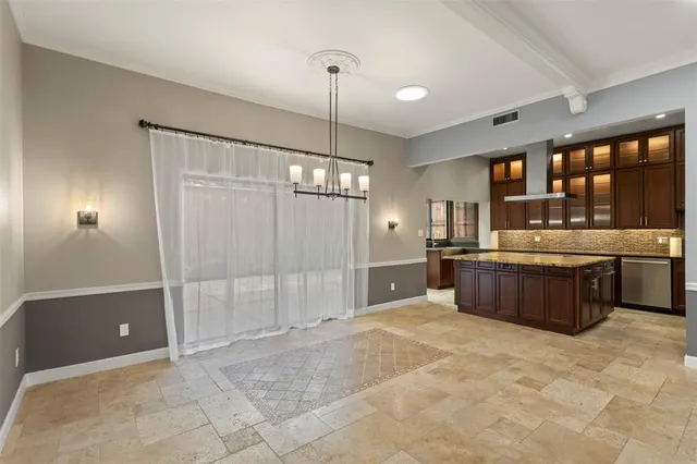 a large kitchen with a cabinets and counter space
