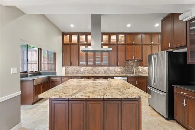 a kitchen with a stove a refrigerator a sink and dishwasher