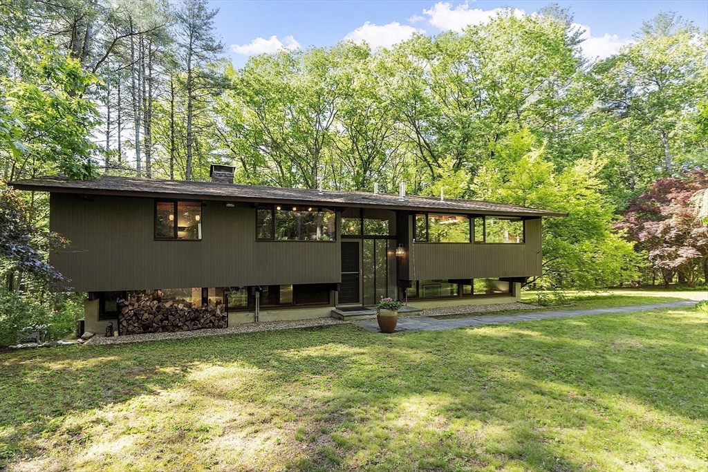 swimming pool view with a outdoor seating