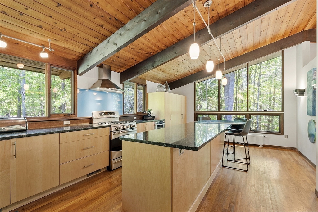 157 Carleton Road Carlisle, MA 01741 - Photo 16 of 42 a view of a kitchen with a large window