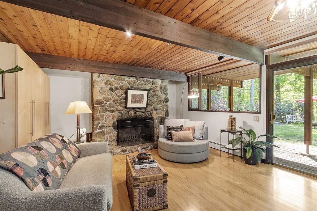 157 Carleton Road Carlisle, MA 01741 - Photo 28 of 42 a living room with furniture and a large window