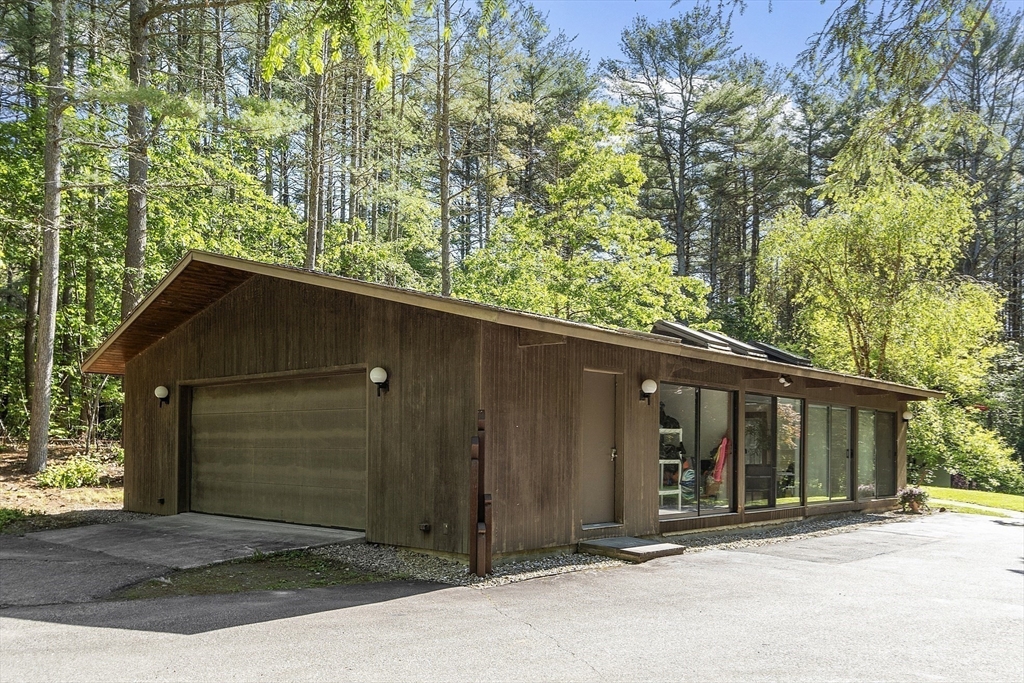 157 Carleton Road Carlisle, MA 01741 - Photo 37 of 42 a backyard of a house