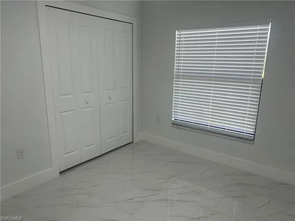 a view of a room that has a window in it