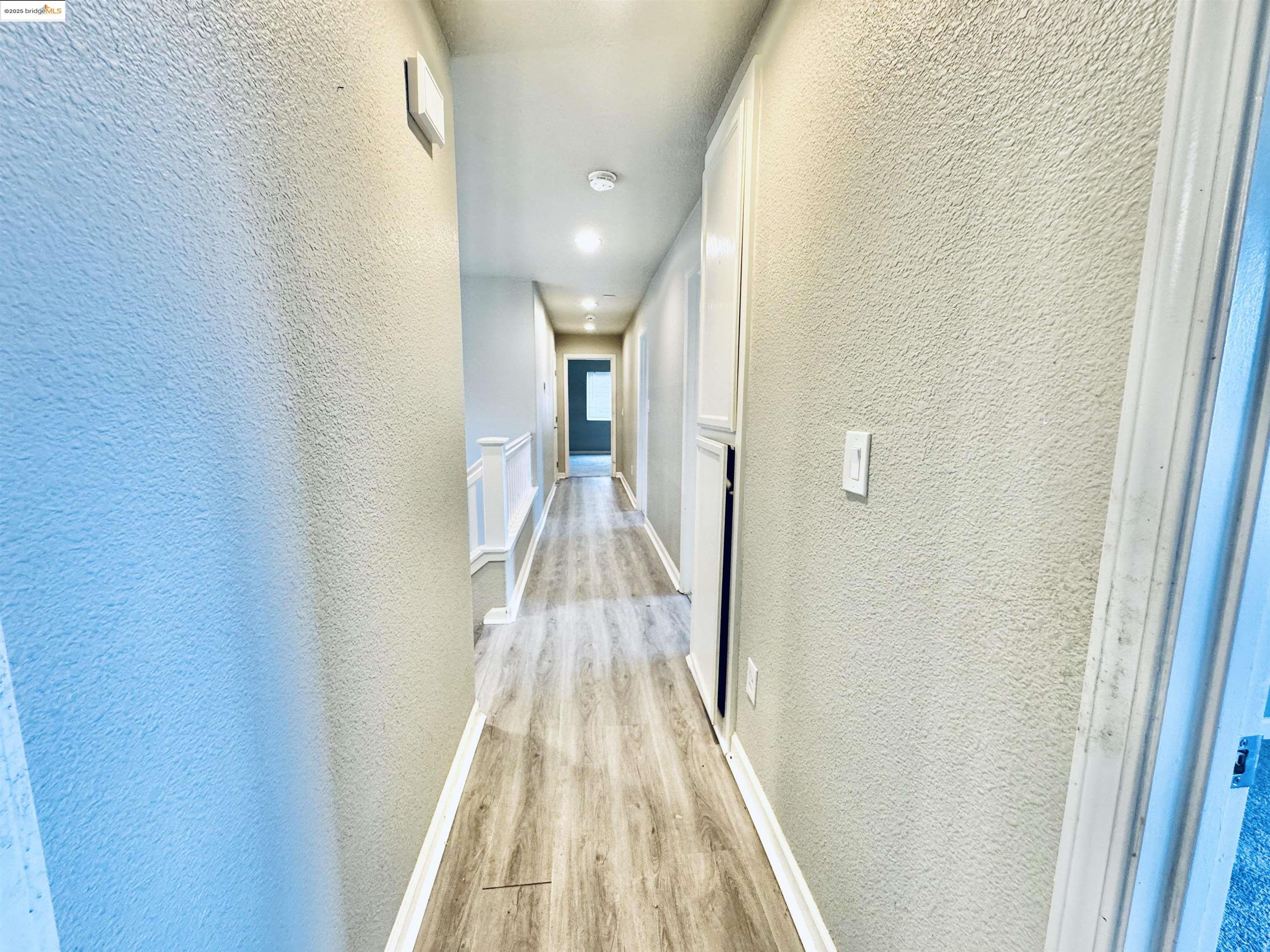 756 Rubier Way Rio Vista, CA 94571 - Photo 11 of 20 a view of a hallway with wooden floor