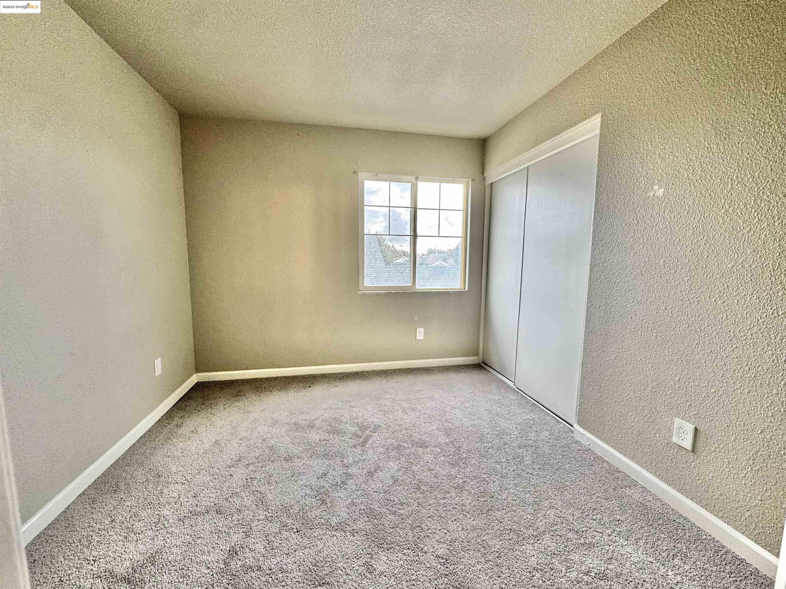 756 Rubier Way Rio Vista, CA 94571 - Photo 13 of 20 an empty room with a natural light