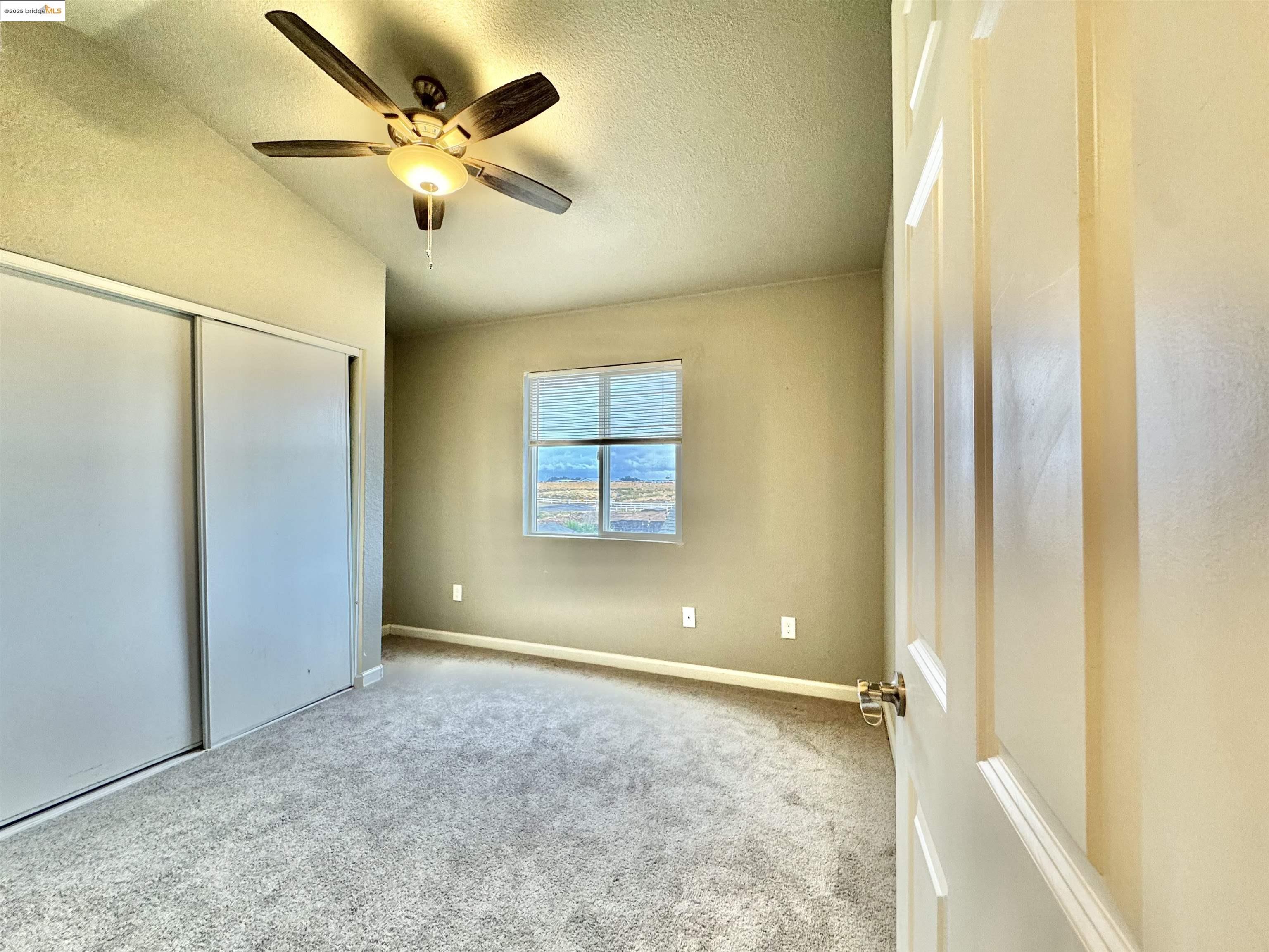 756 Rubier Way Rio Vista, CA 94571 - Photo 15 of 20 a view of an empty room with a window