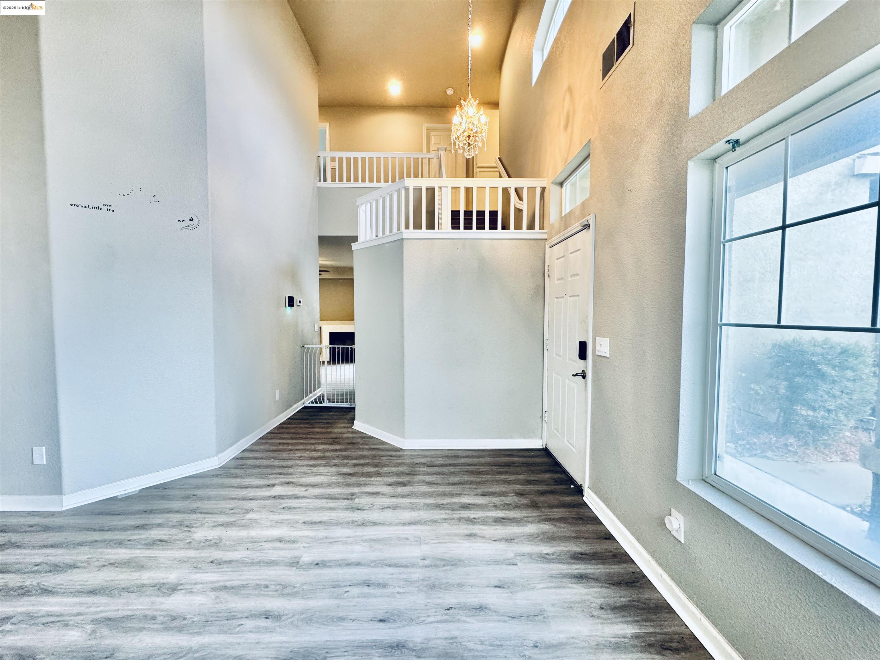 756 Rubier Way Rio Vista, CA 94571 - Photo 2 of 20 a view of a hallway with wooden floor and entryway