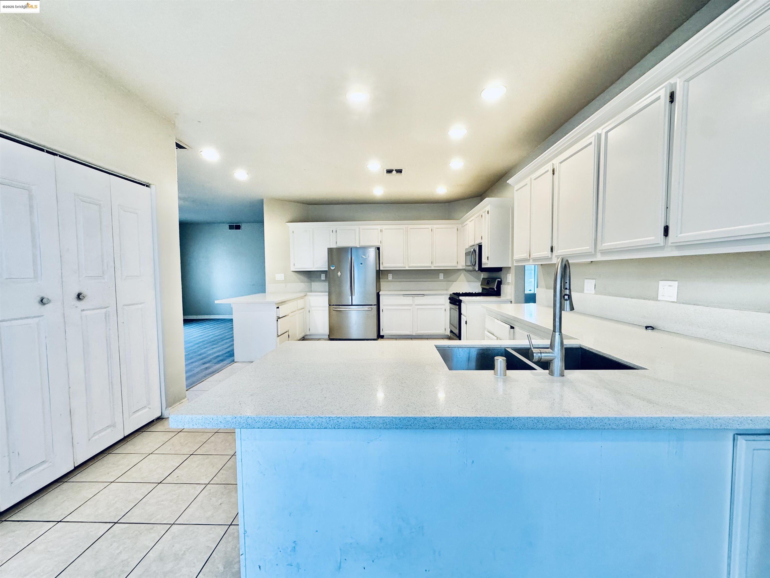 756 Rubier Way Rio Vista, CA 94571 - Photo 7 of 20 a large kitchen with lots of counter top space