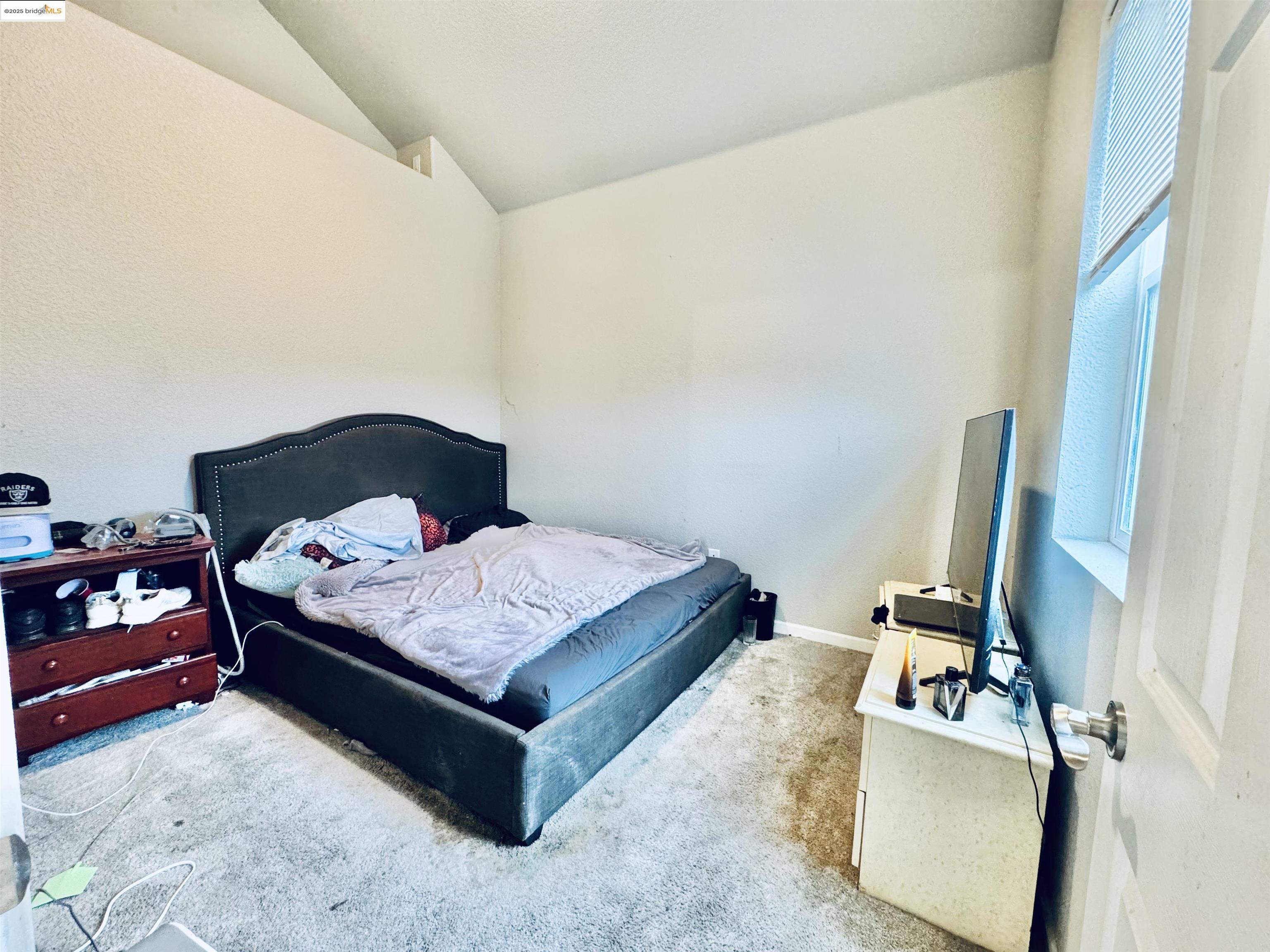 756 Rubier Way Rio Vista, CA 94571 - Photo 9 of 20 a bedroom with a bed and window