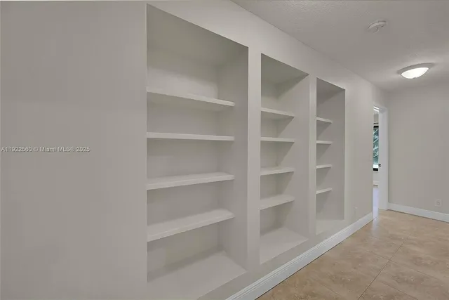 a view of an empty walk in closet