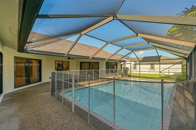 a view of a house with a swimming pool
