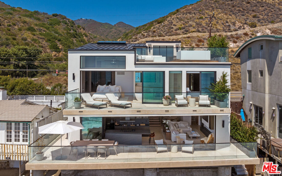 18954 Pacific Coast Highway Malibu, CA 90265 - Photo 3 of 70 a view of house with outdoor seating space