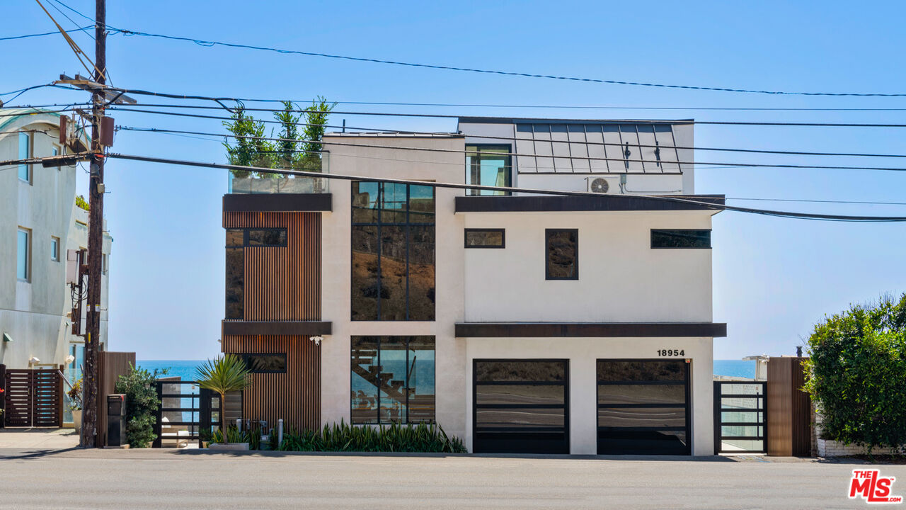 18954 Pacific Coast Highway Malibu, CA 90265 - Photo 4 of 70 a front view of a building with a street