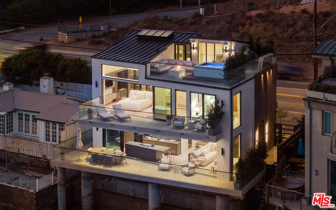 18954 Pacific Coast Highway Malibu, CA 90265 - Photo 52 of 70 a view of dinning table and chairs in patio