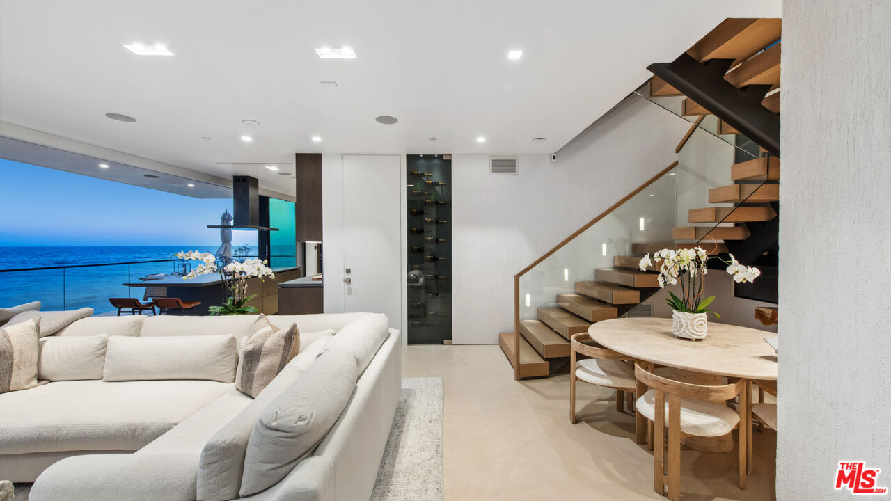 18954 Pacific Coast Highway Malibu, CA 90265 - Photo 54 of 70 a living room with furniture and wooden floor