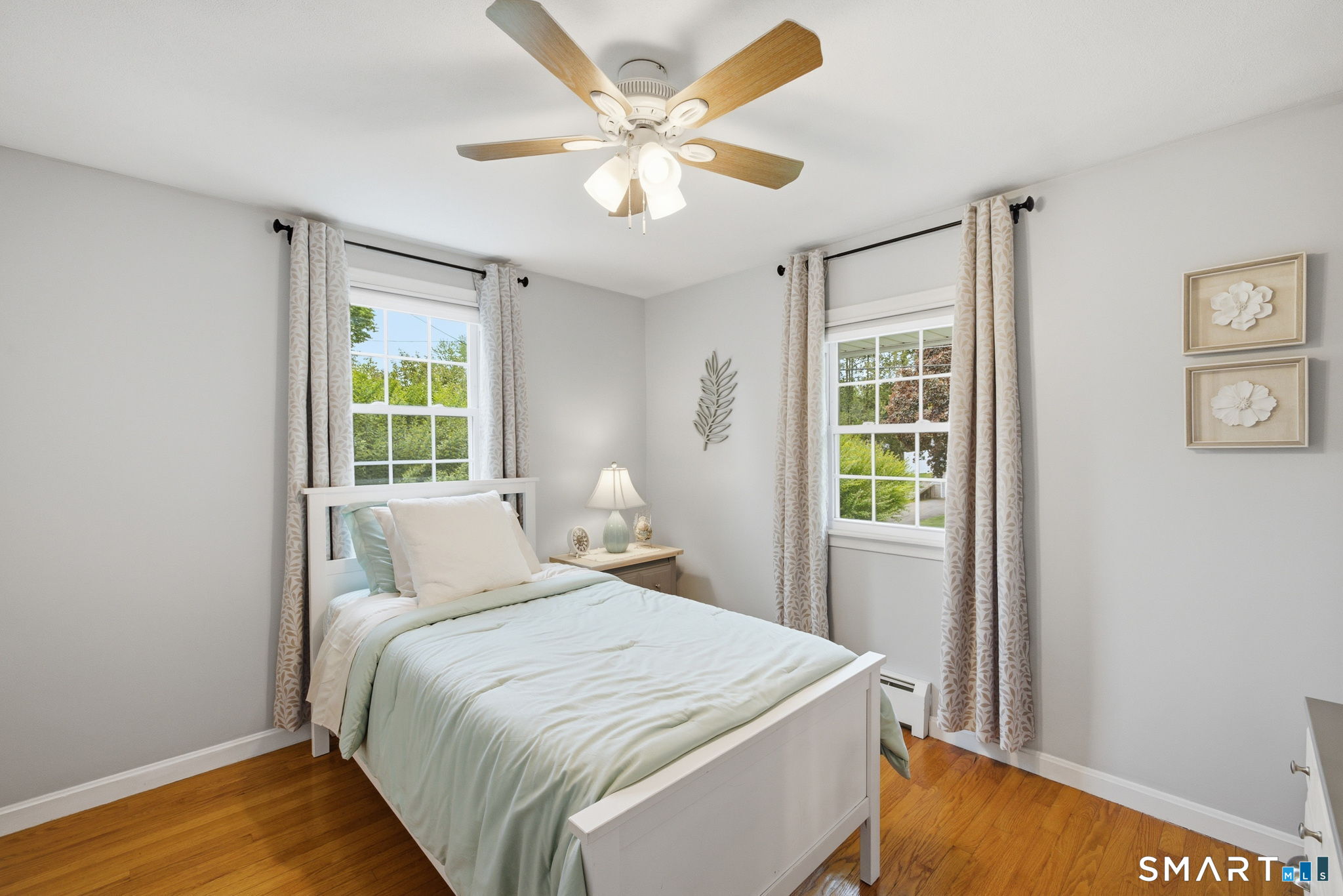 7 Stardust Drive Enfield, CT 06082 - Photo 15 of 38 a bedroom with a bed and a window