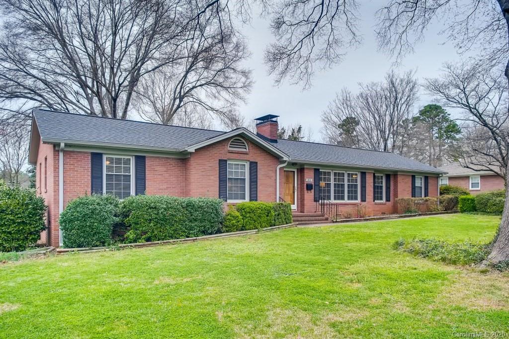 4921 Cheviot Road Charlotte, NC 28269 - Photo 3 of 28 front view of a house with a yard