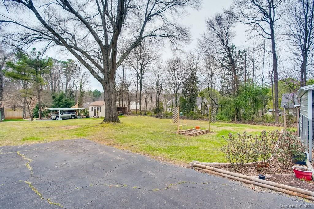4921 Cheviot Road Charlotte, NC 28269 - Photo 28 of 28 a view of a swimming pool with an outdoor space