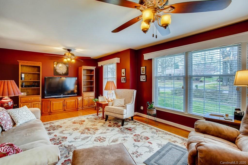 4921 Cheviot Road Charlotte, NC 28269 - Photo 9 of 28 a living room with furniture and a large window