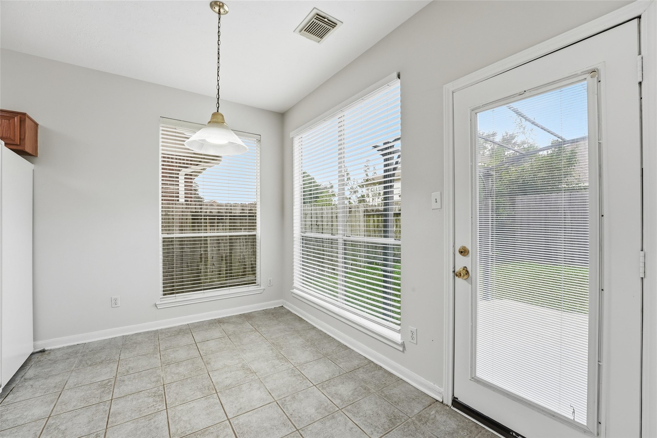 8522 Chickamauga Lane Houston, TX 77083 - Photo 11 of 33 a view of an empty room with a window