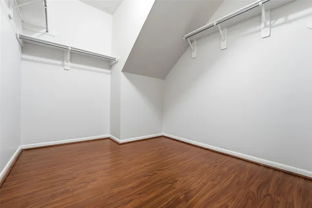 a view of an empty walk in closet