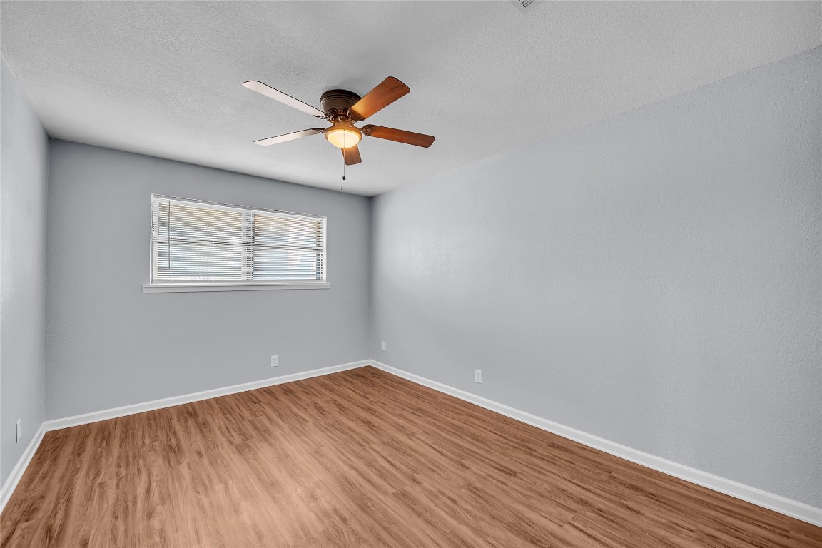 310 Hruskaville Road Temple, TX 76501 - Photo 15 of 21 Unfurnished room featuring light wood-type flooring and ceiling fan