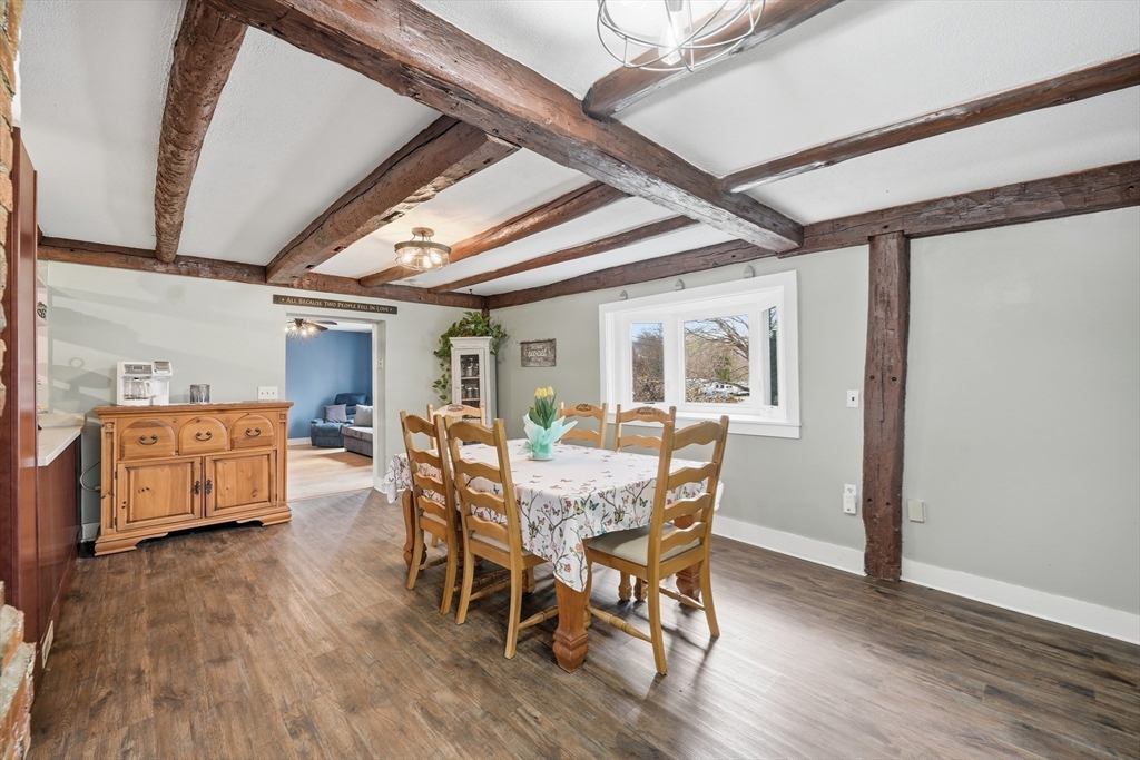 79 State Road Whately, MA 01373 - Photo 13 of 40 a view of a dining room with furniture and wooden floor