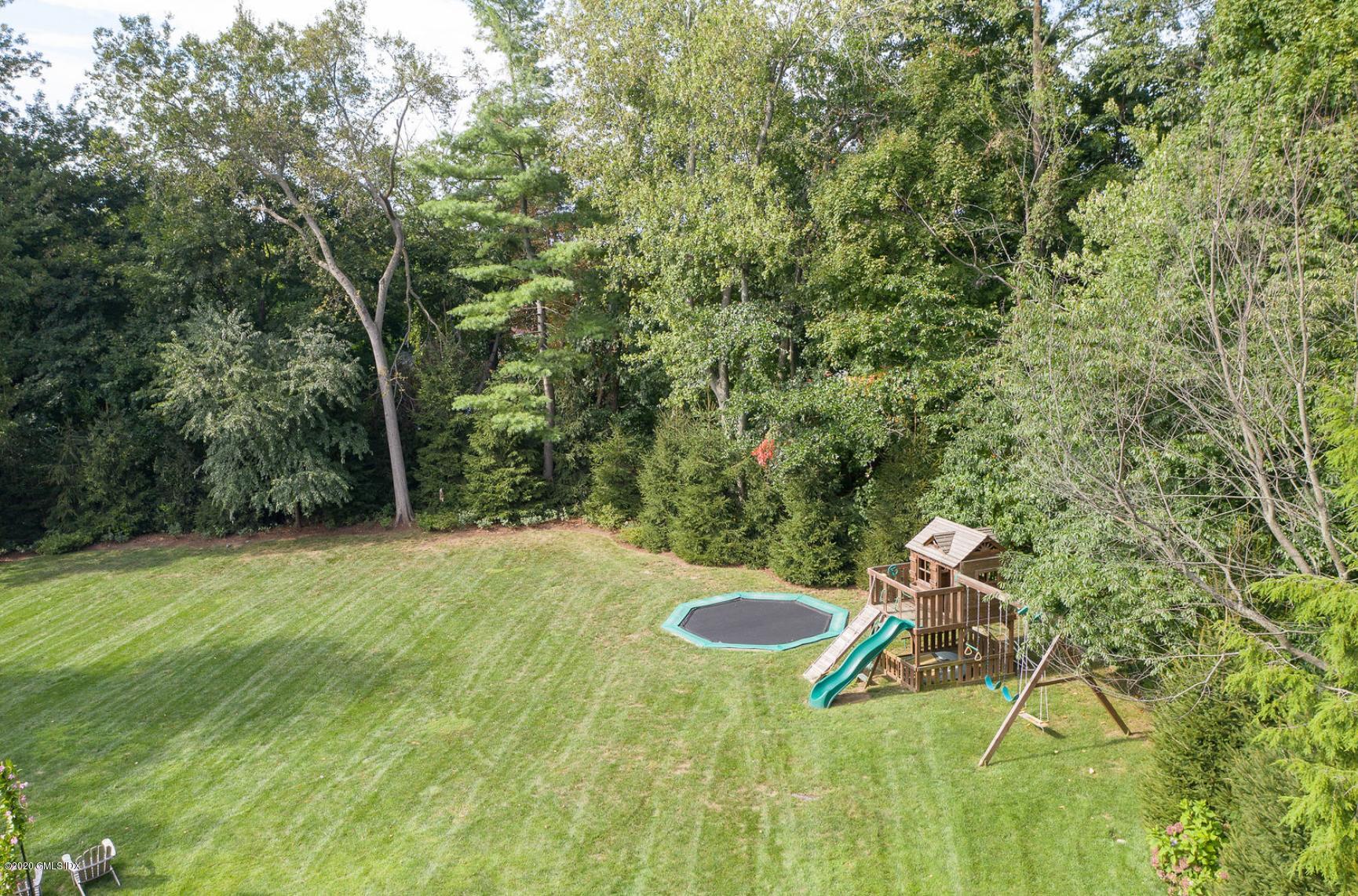 88 Birch Lane Greenwich, CT 06830 - Photo 27 of 33 a view of a backyard