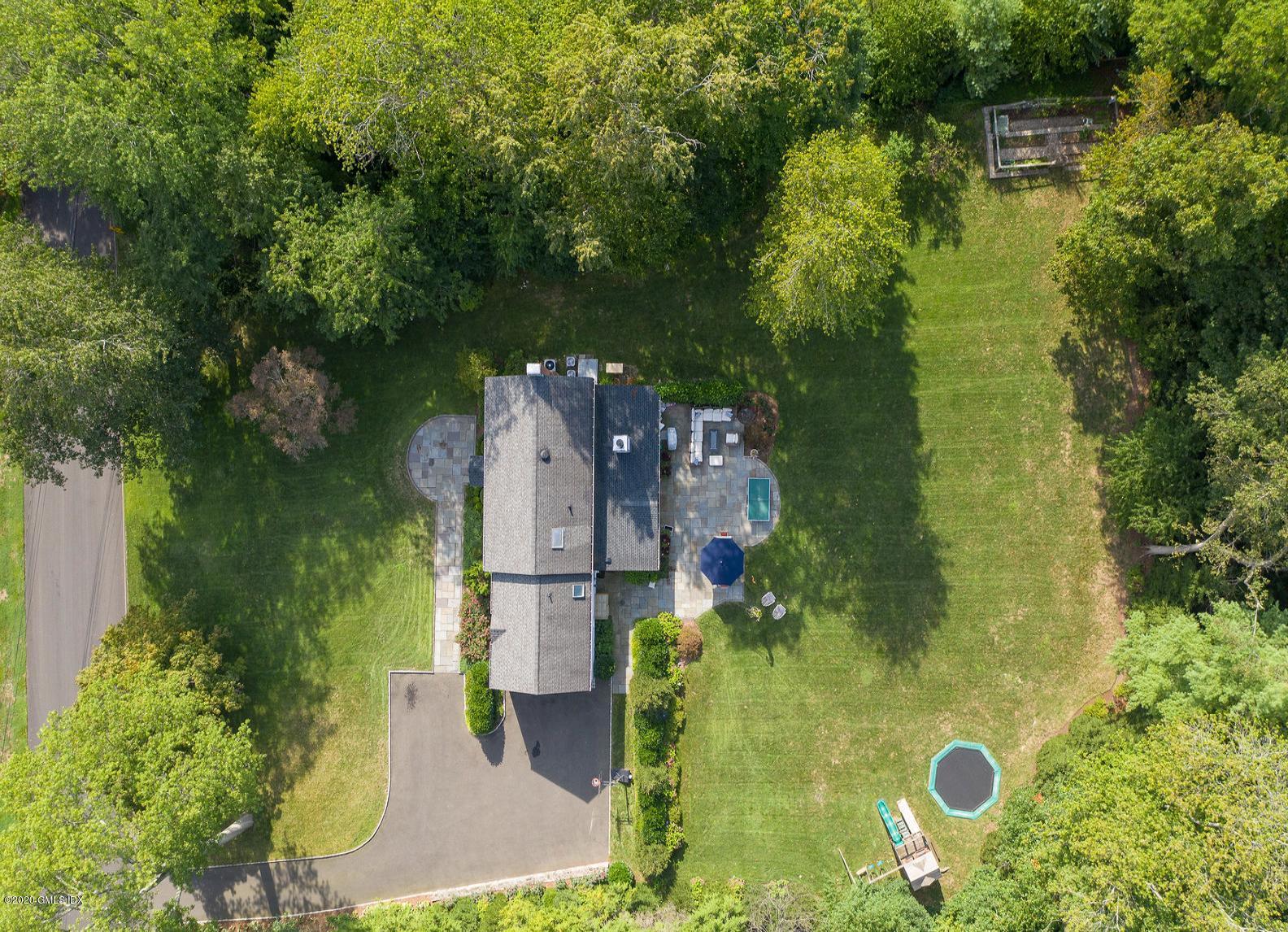 88 Birch Lane Greenwich, CT 06830 - Photo 30 of 33 an aerial view of a house with a yard