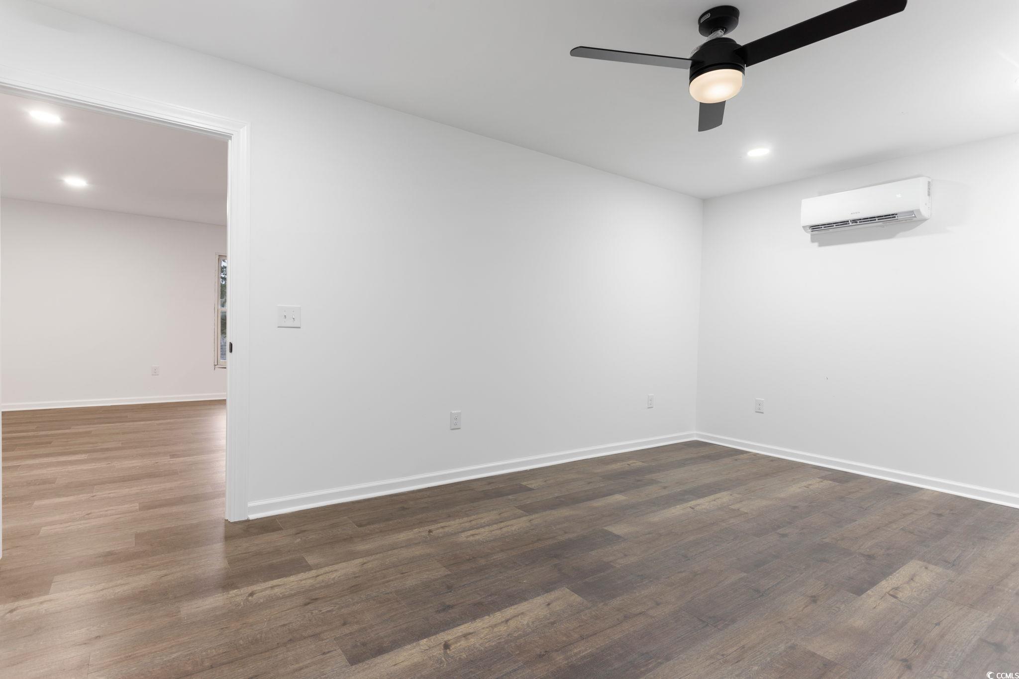 2321 Brick Drive Longs, SC 29568 - Photo 35 of 40 Spare room featuring recessed lighting, dark wood finished floors, and ceiling fan