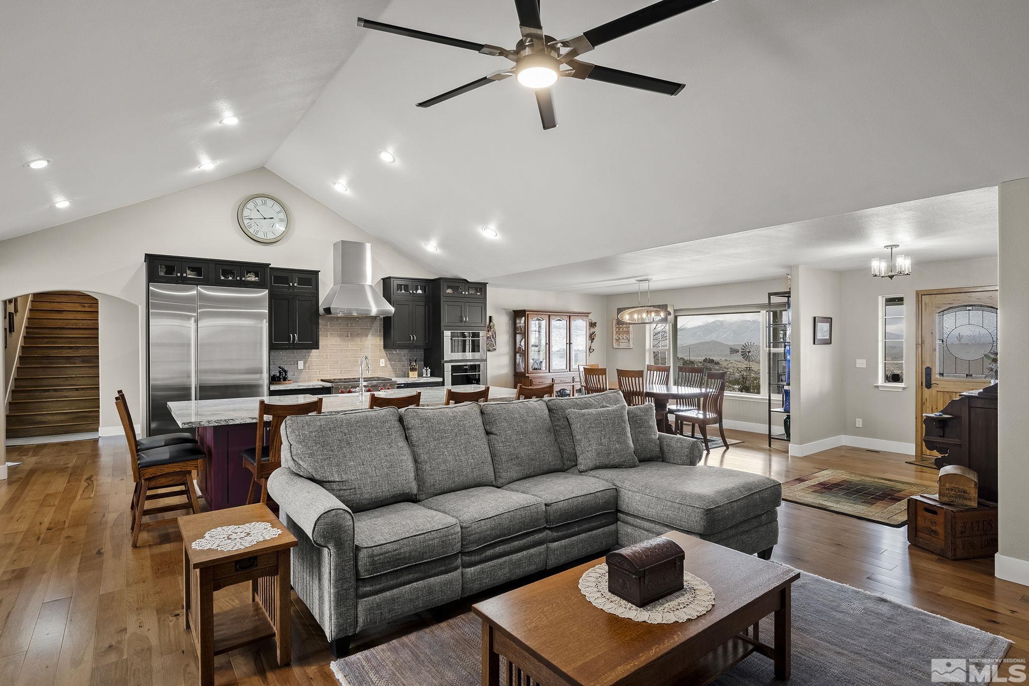 15025 North Red Rock Road Reno, NV 89508 - Photo 17 of 40 a living room with furniture and a view of kitchen