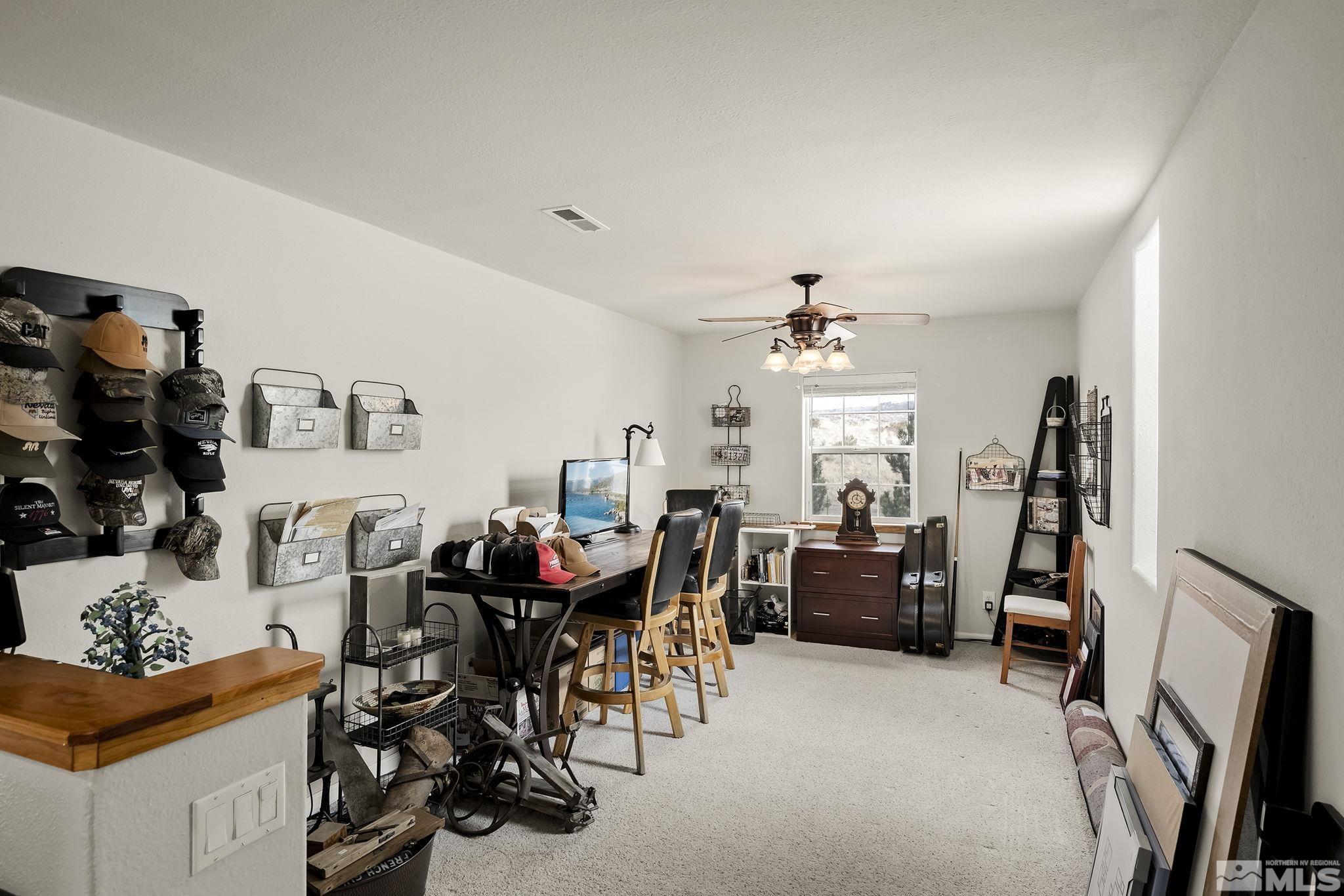 15025 North Red Rock Road Reno, NV 89508 - Photo 32 of 40 a view of a livingroom with furniture and a window