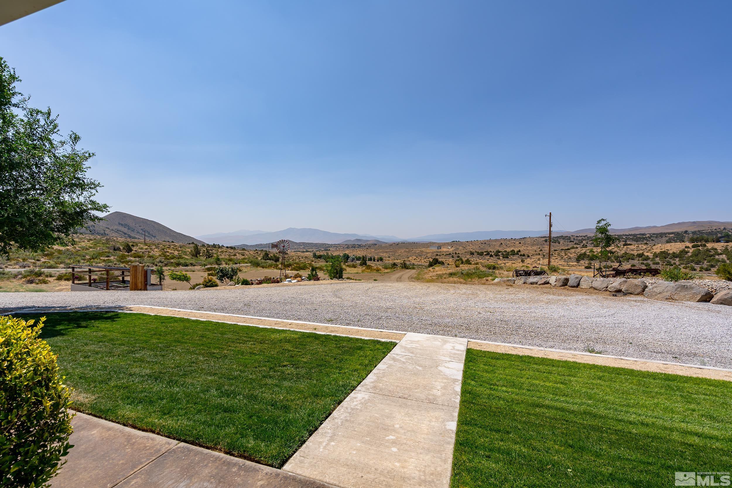 15025 North Red Rock Road Reno, NV 89508 - Photo 5 of 40 a view of a lake with a big yard