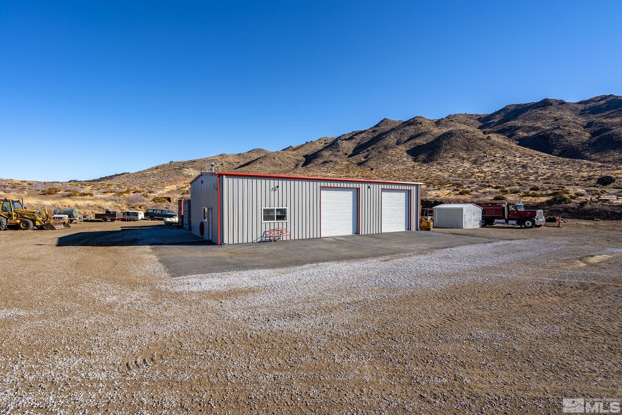 15025 North Red Rock Road Reno, NV 89508 - Photo 10 of 40 a view of a house with a backyard