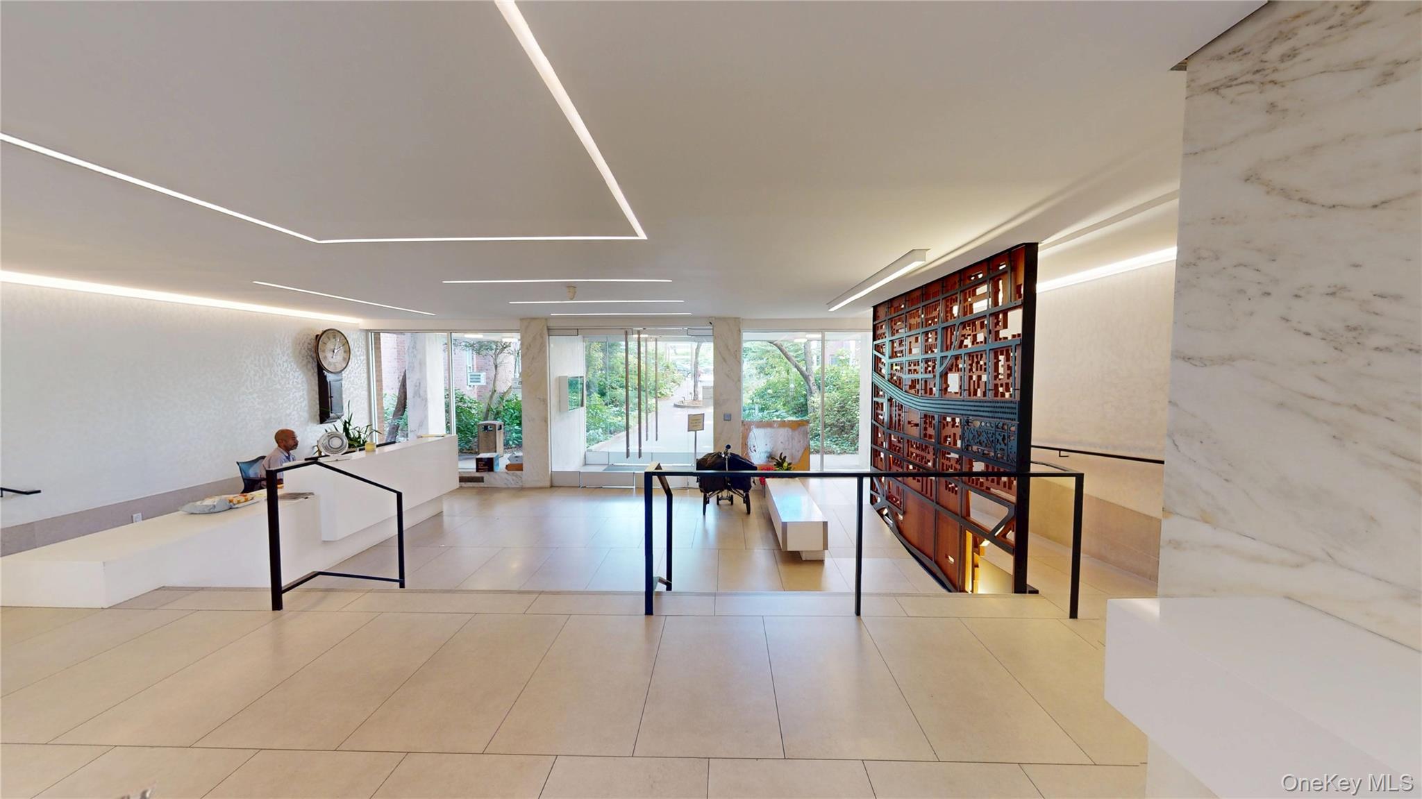 800 Grand Concourse, Unit 2DN Bronx, NY 10451 - Photo 13 of 15 a dining room with furniture and a floor to ceiling window