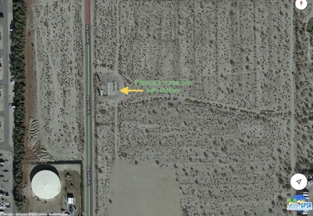 70777 Dillon Road Desert Hot Springs, CA 92241 - Photo 2 of 5 a bathroom with a shower curtain and a sink