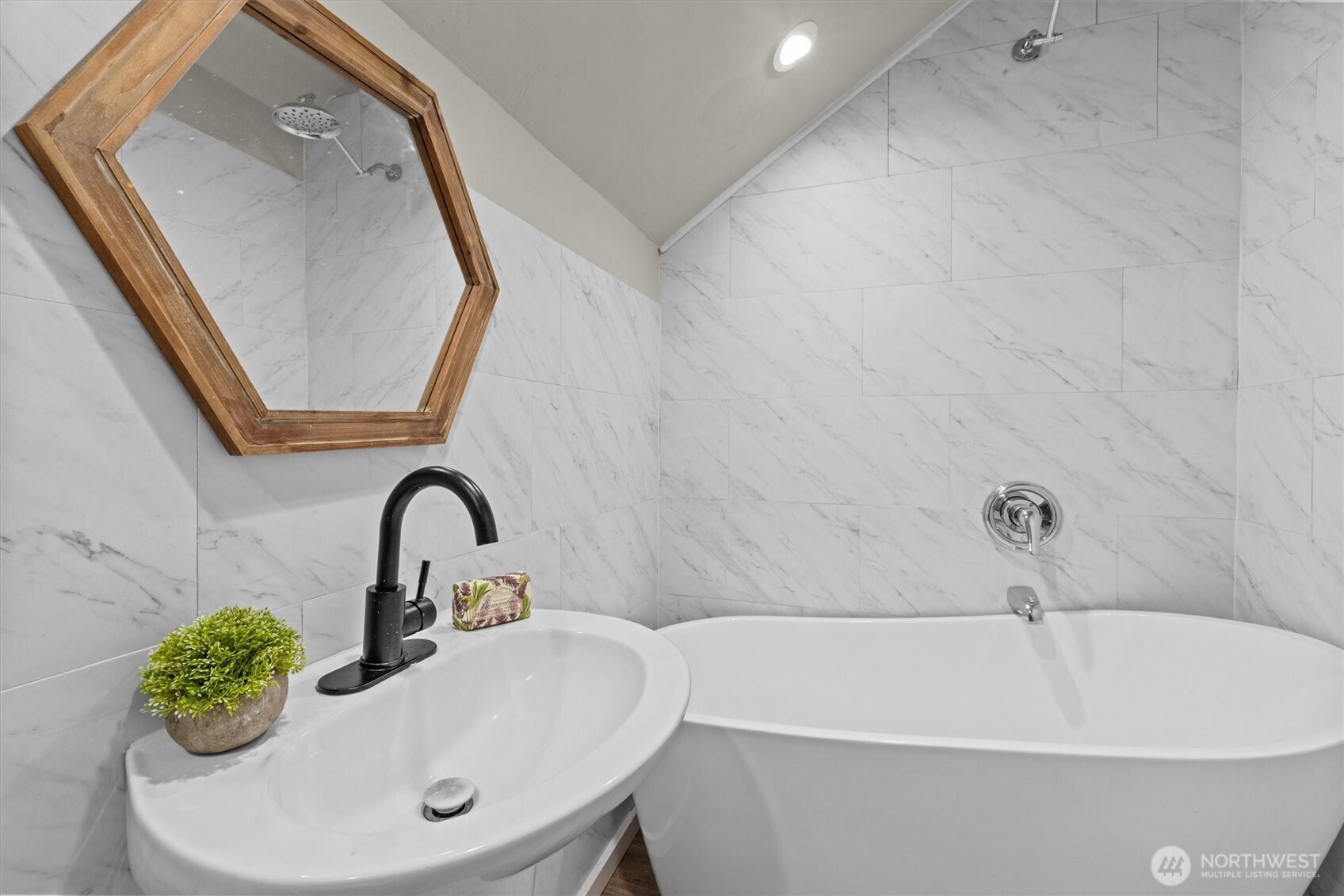 1211 North 3rd Street Renton, WA 98057 - Photo 17 of 40 a bathroom with a sink and a mirror