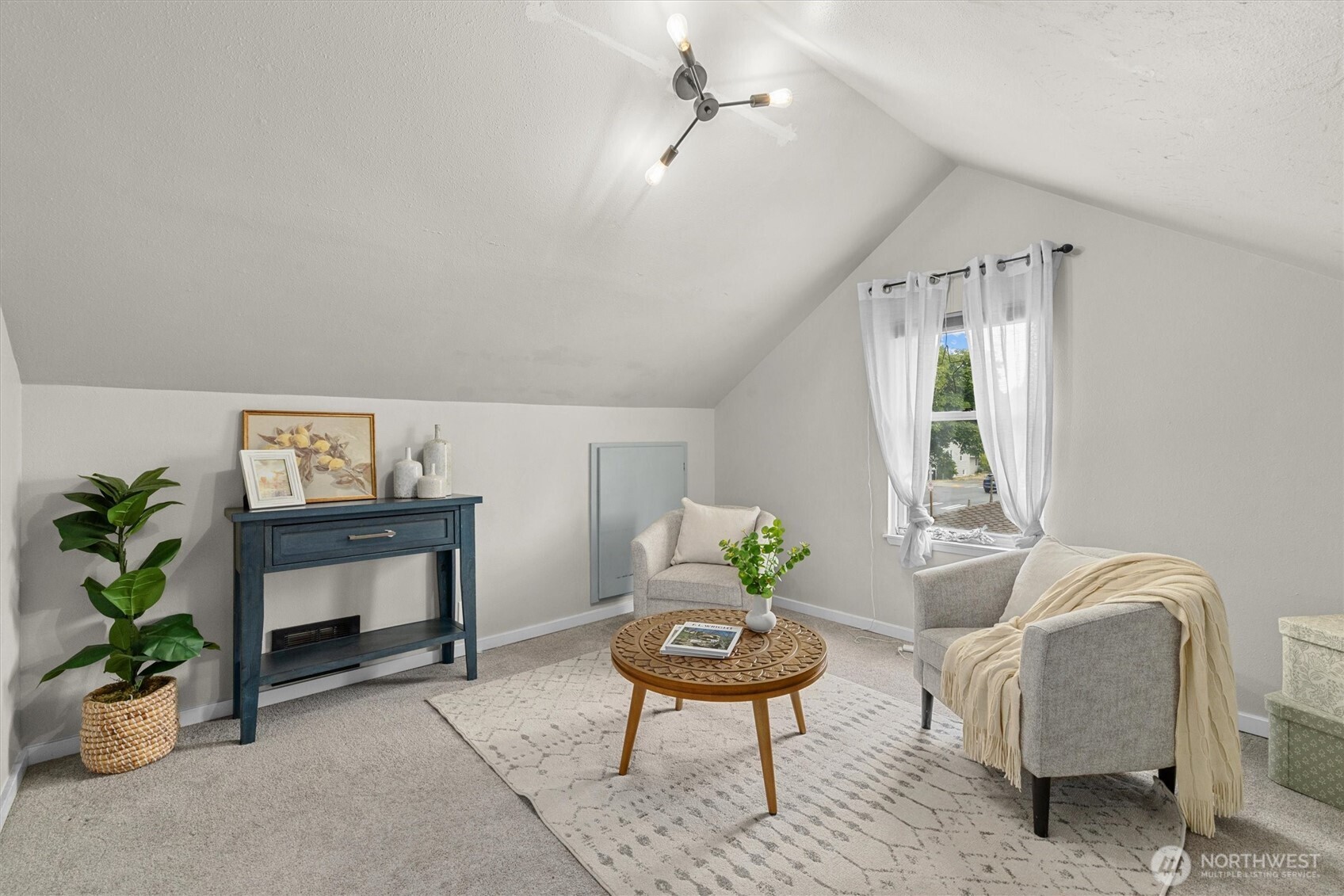 1211 North 3rd Street Renton, WA 98057 - Photo 18 of 40 a living room with furniture and a potted plant