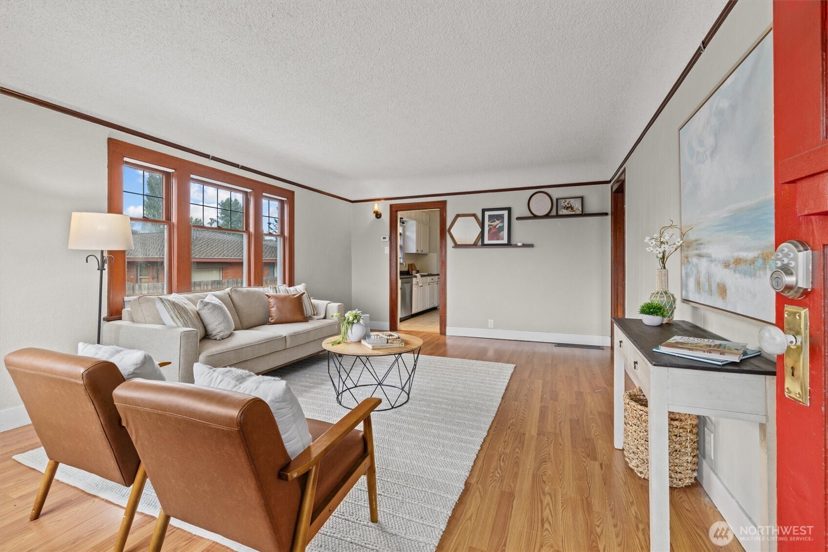 1211 North 3rd Street Renton, WA 98057 - Photo 2 of 40 a living room with furniture and a rug
