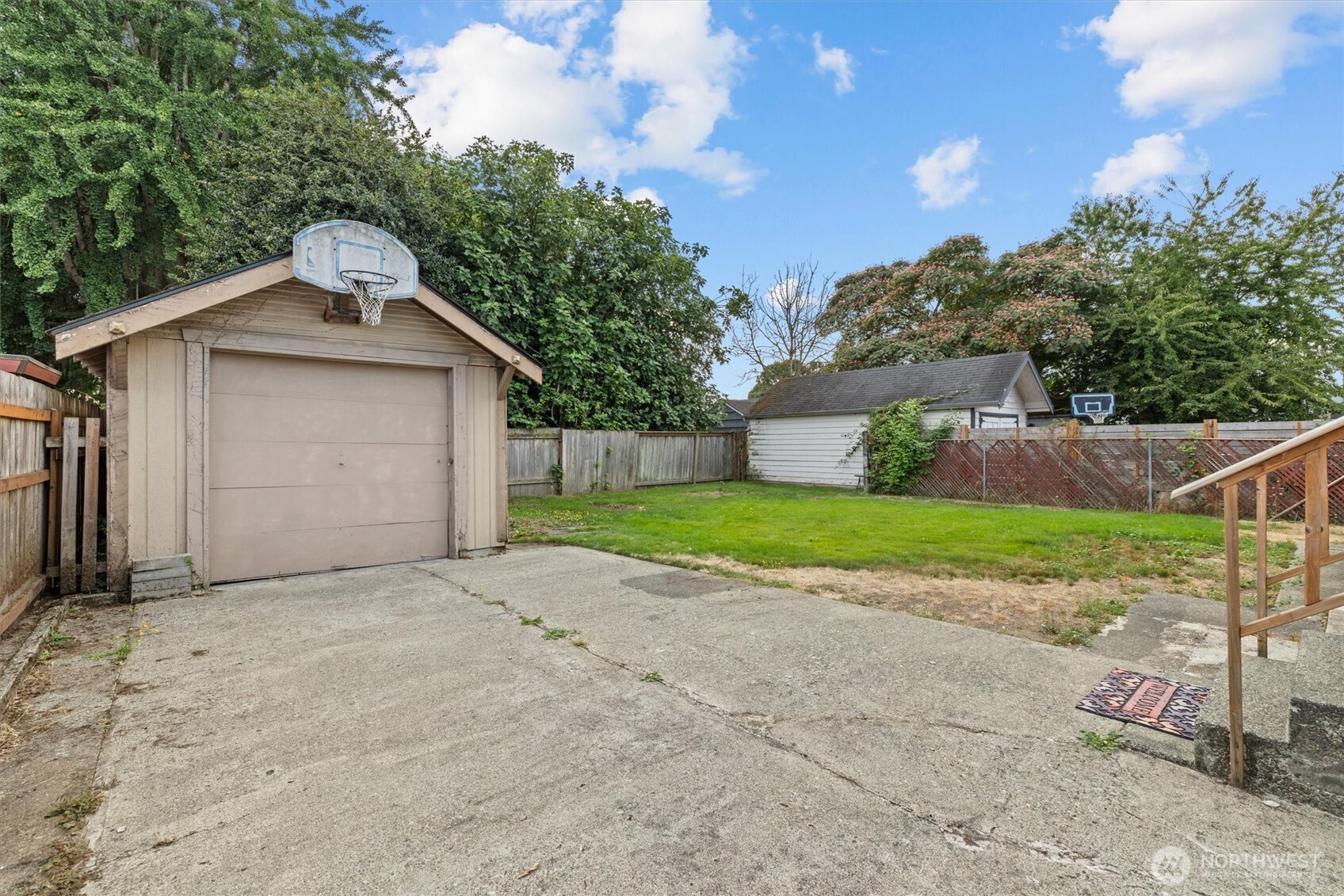1211 North 3rd Street Renton, WA 98057 - Photo 30 of 40 a view of a house with a yard