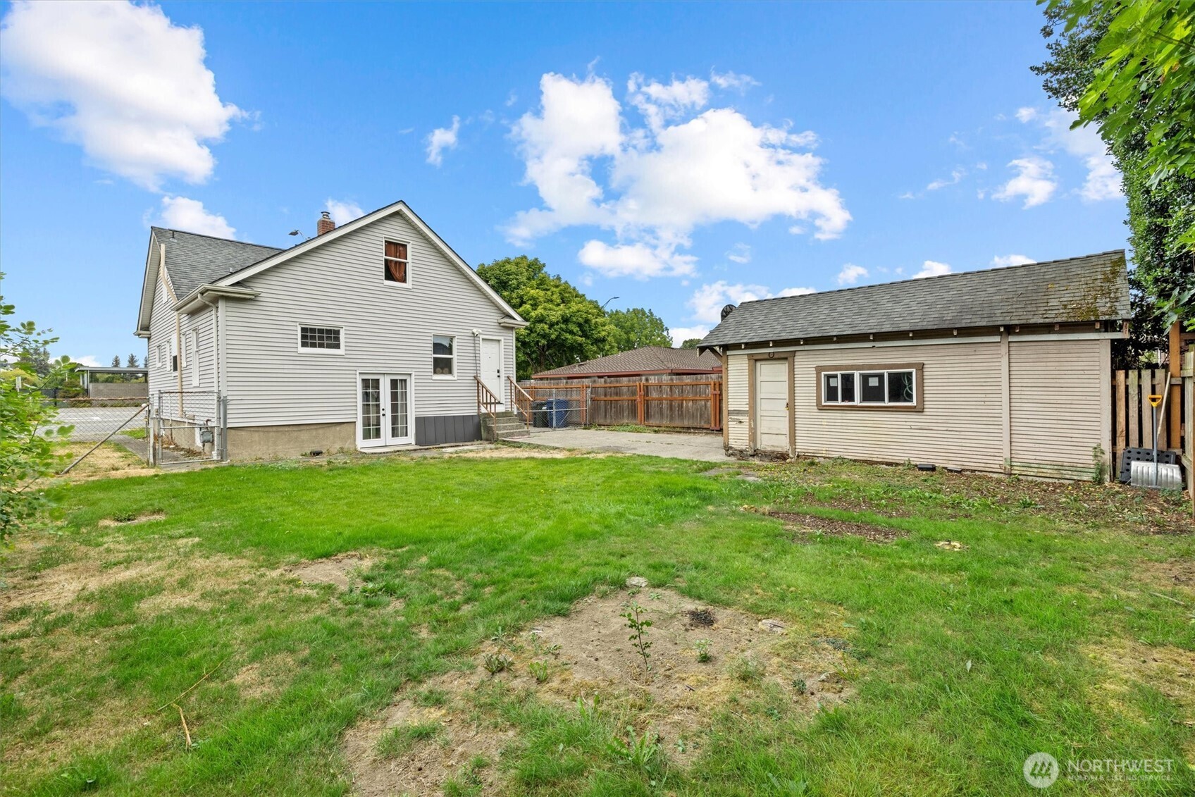 1211 North 3rd Street Renton, WA 98057 - Photo 34 of 40 a view of a house with backyard