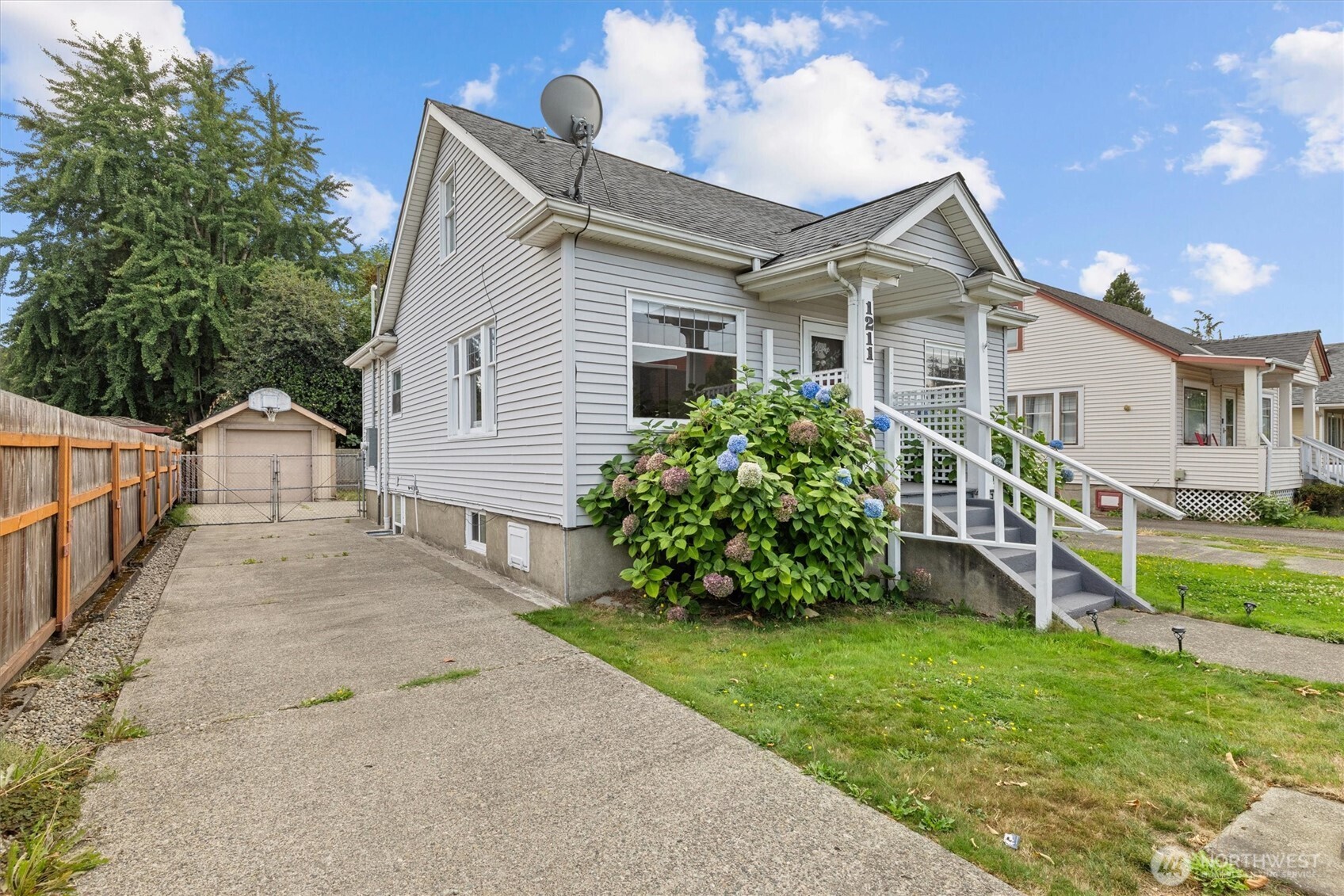 1211 North 3rd Street Renton, WA 98057 - Photo 35 of 40 a view of front of house with a yard