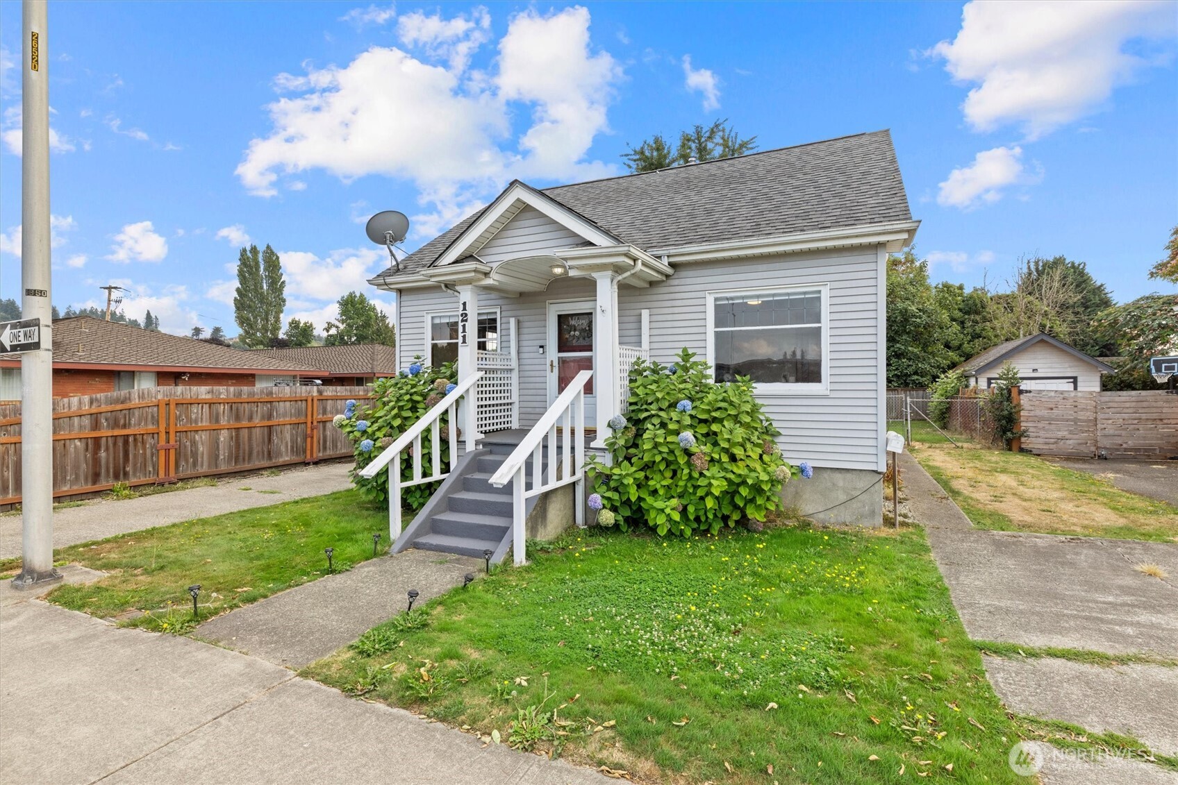 1211 North 3rd Street Renton, WA 98057 - Photo 36 of 40 a view of a house with a yard and plants